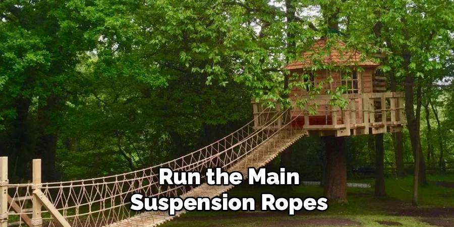 Run the Main Suspension Ropes