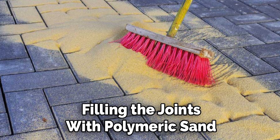 Filling the Joints with Polymeric Sand