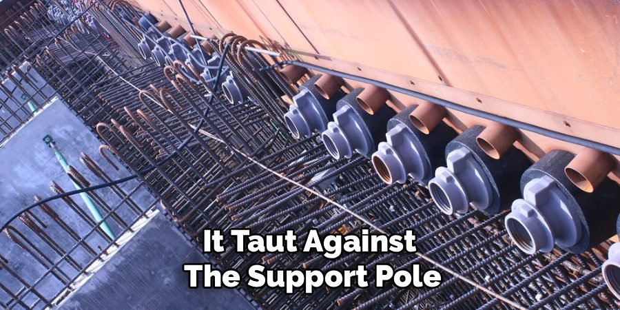 It Taut Against
The Support Pole