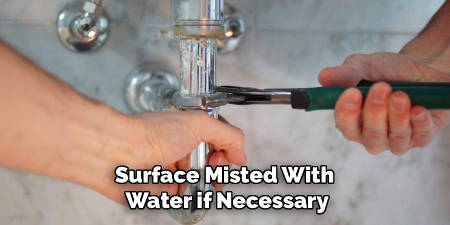 Surface Misted With 
Water if Necessary