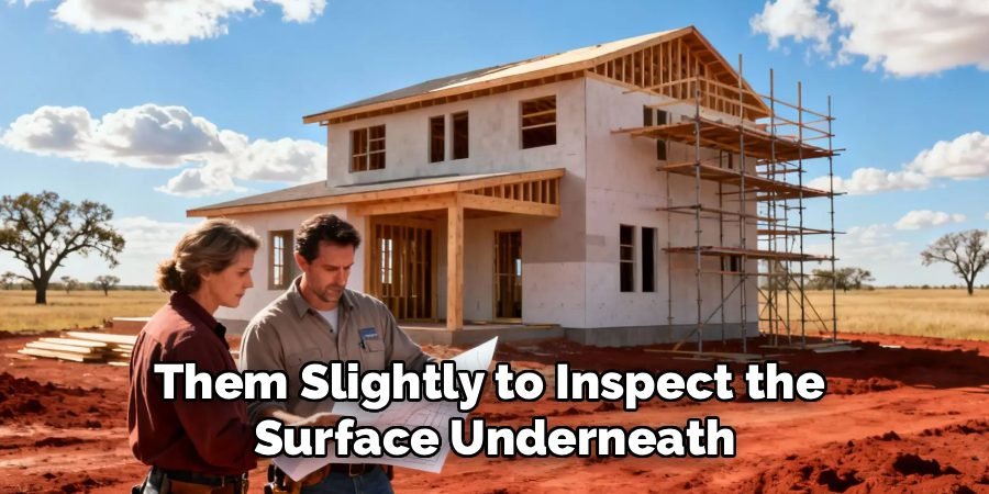 Them Slightly to Inspect the 
Surface Underneath