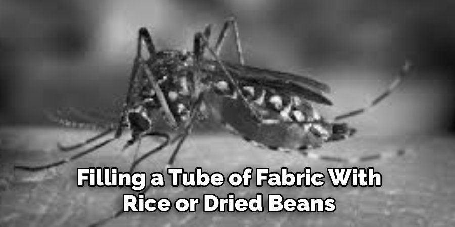 Filling a Tube of Fabric With
Rice or Dried Beans