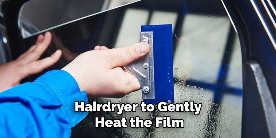 Hairdryer to Gently 
Heat the Film