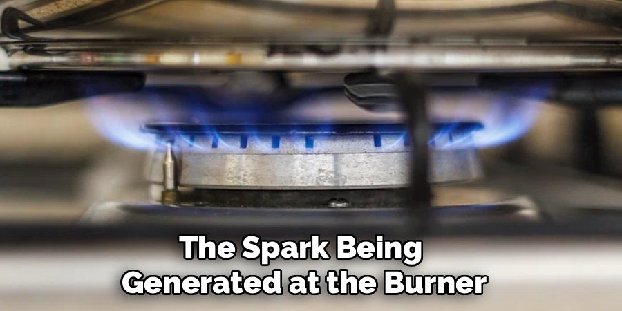 The Spark Being
Generated at the Burner