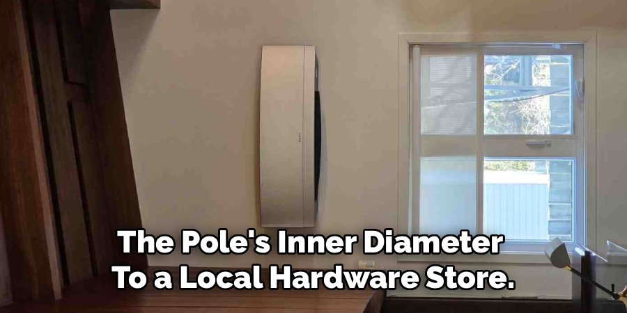 The Pole's Inner Diameter 
To a Local Hardware Store.