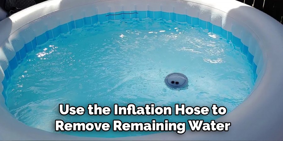 Use the Inflation Hose to Remove Remaining Water